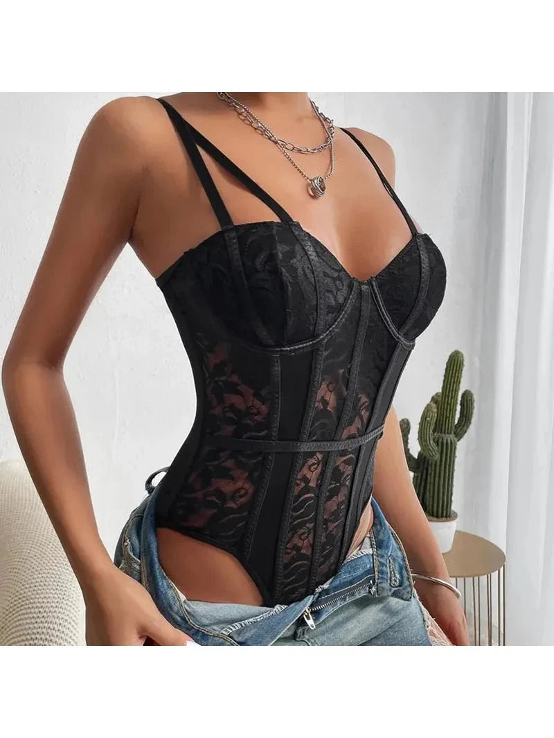 Black embroidered corset bodysuit by Celine, shown on a model, featuring intricate embroidery and a fitted design.