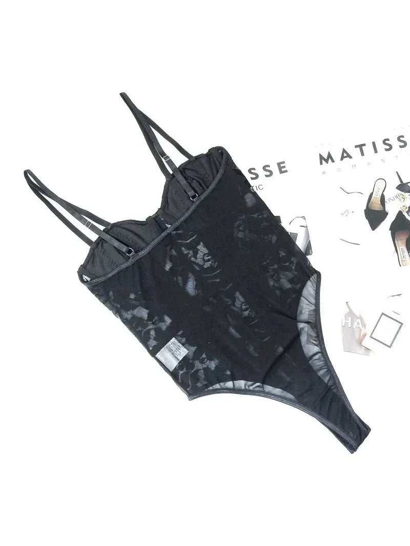 Black Celine embroidered corset bodysuit by Lumina Vancouver, featuring intricate embroidery and a fitted, stylish design.