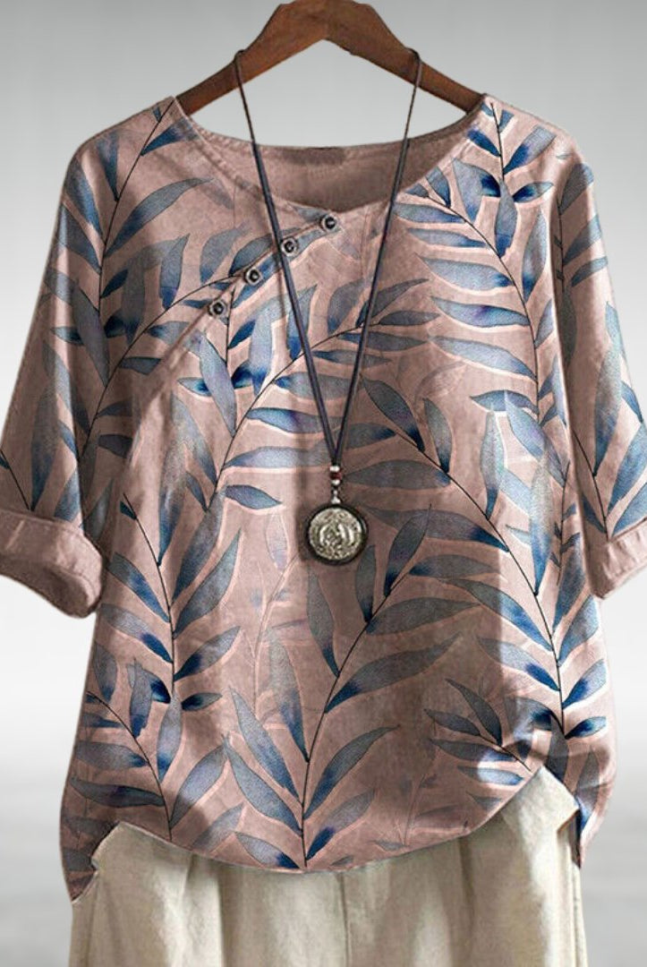 Blue Charlotte Breezy Leaf Print Blouse by Lumina Wear with button-up design, lightweight fabric, and relaxed fit.