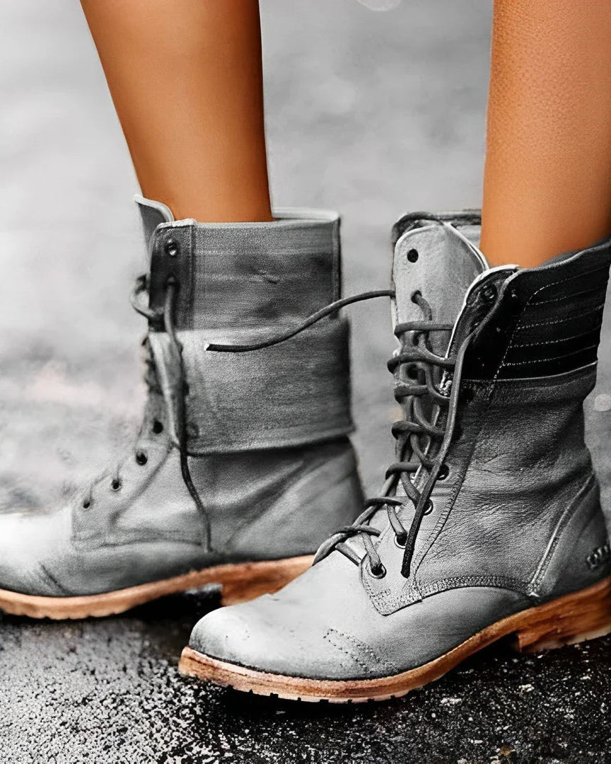 Black Chloe Rugged Lace-Up Combat Boots for Women by Lumina Wear, featuring sturdy design and thick soles.