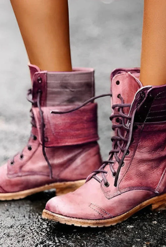 Lumina Wear Chloe black lace-up combat boots for women, rugged style with sturdy soles and ankle-high design.