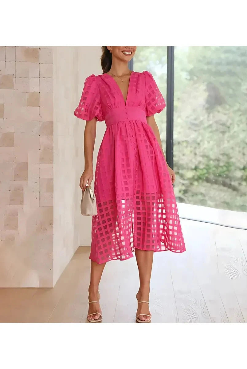 Pink Cindy midi dress by Lumina Vancouver featuring classic patterns and puff sleeves, perfect for stylish occasions.