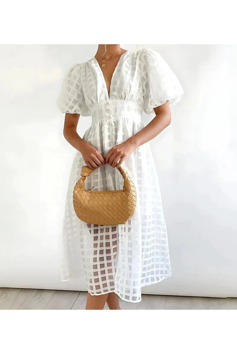 Pink Cindy classic patterned puff sleeve midi dress by Lumina Vancouver, featuring a stylish midi length and elegant puff sleeves.