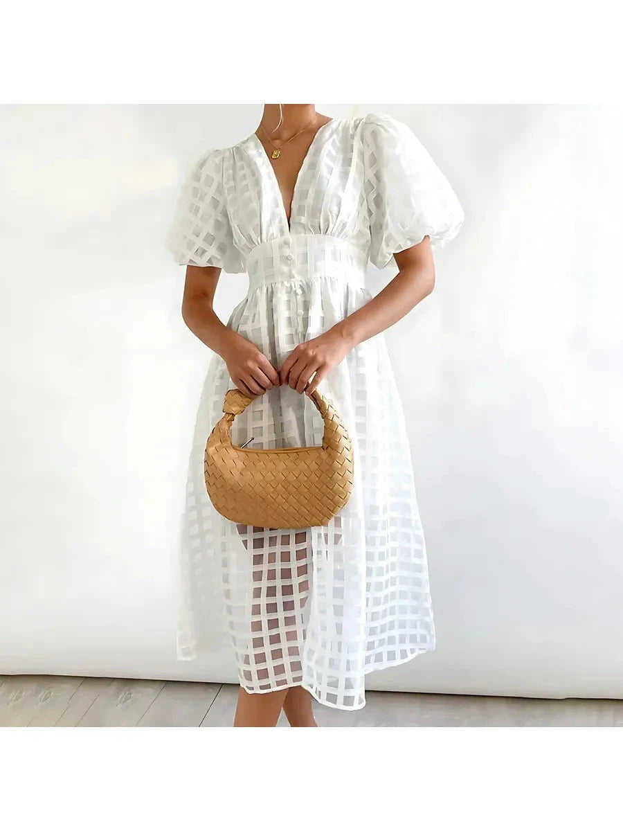 Pink Cindy classic patterned puff sleeve midi dress by Lumina Vancouver, featuring a stylish midi length and elegant puff sleeves.