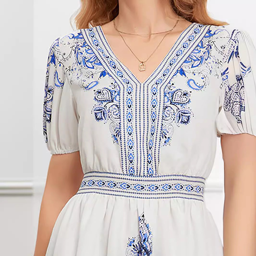 White printed cotton mini dress by Lumina Vancouver featuring a stylish, lightweight design and a flattering fit.