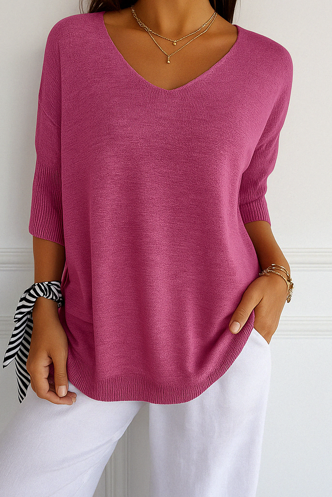 Dark gray Lumina Wear Clara relaxed V-neck women's sweater with minimalist design, cozy fit, and soft knit fabric.