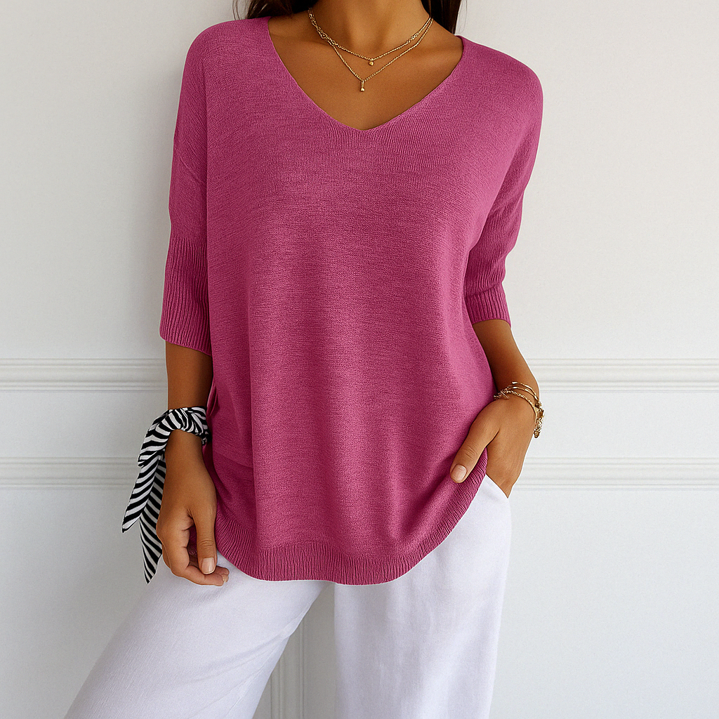 Dark gray Lumina Wear Clara relaxed V-neck women's sweater with minimalist design, cozy fit, and soft knit fabric.