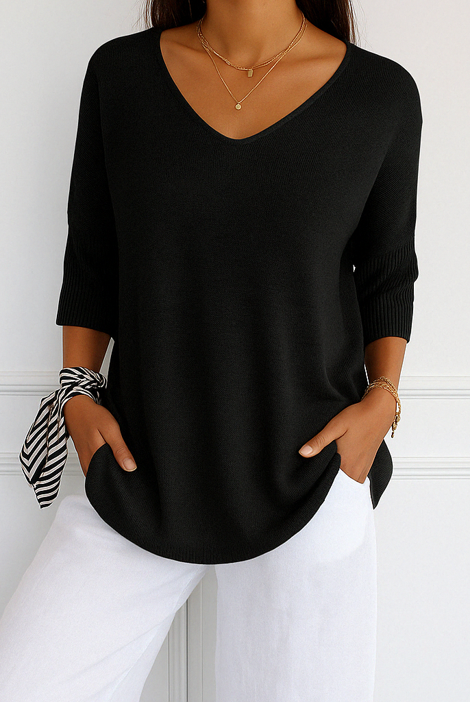 Dark gray Lumina Wear Clara relaxed V-neck sweater for women, minimalist design, casual fit, lightweight and comfortable.
