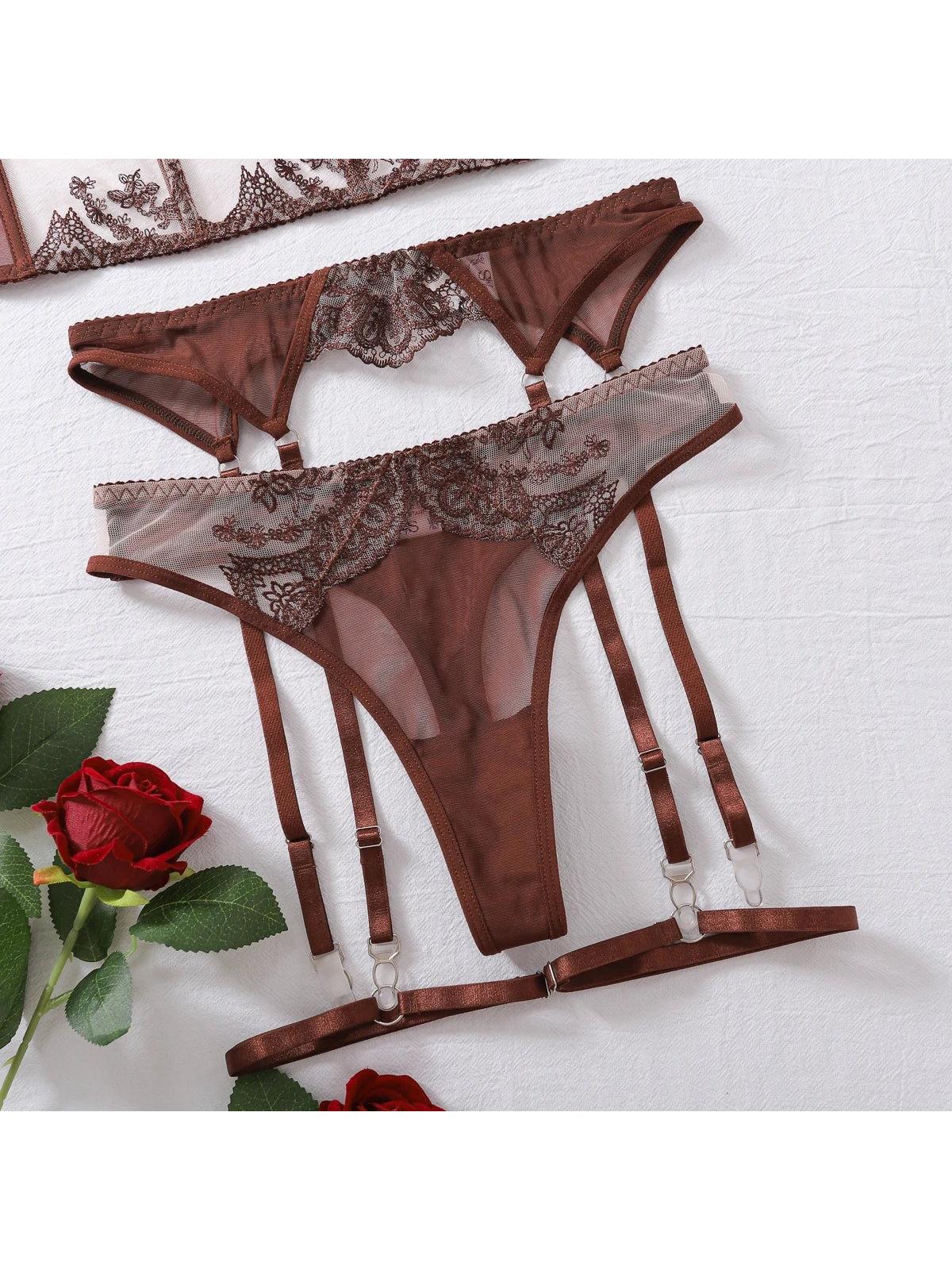 Cosette's lingerie set by Lumina Vancouver featuring delicate lace bras and matching panties in soft pastel colors.