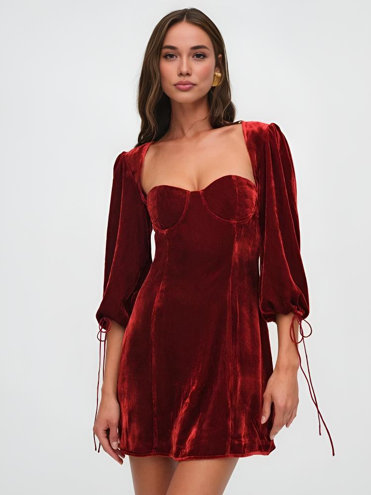 Maroon velvet mini dress with puff sleeves by Lumina Vancouver, featuring a fitted silhouette and stylish design.