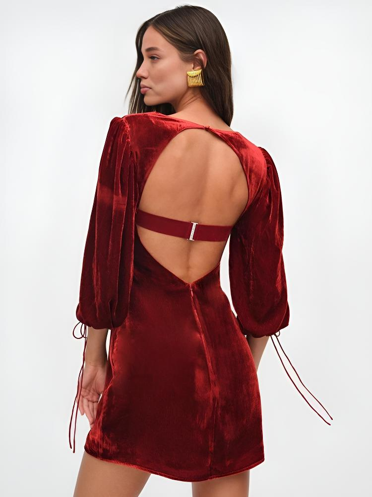 Maroon velvet mini dress with puff sleeves from Lumina Vancouver's Crimson Dawn collection, stylish and fitted for trendy occasions.