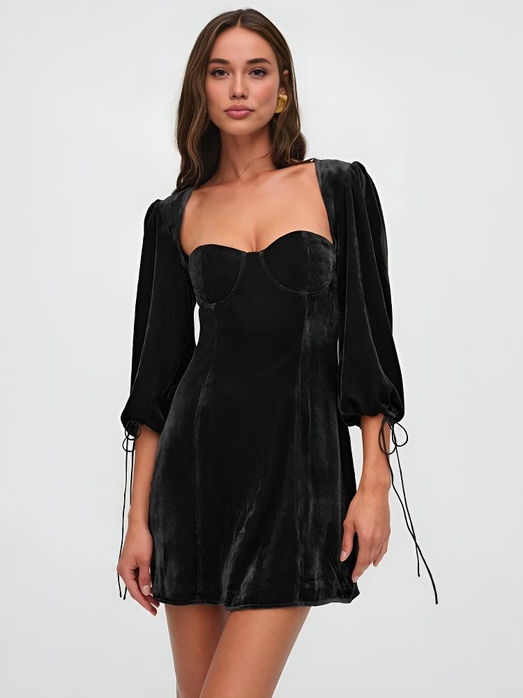 Maroon velvet mini dress with puff sleeves from Lumina Vancouver's Crimson Dawn collection, stylish and fitted for a chic look.