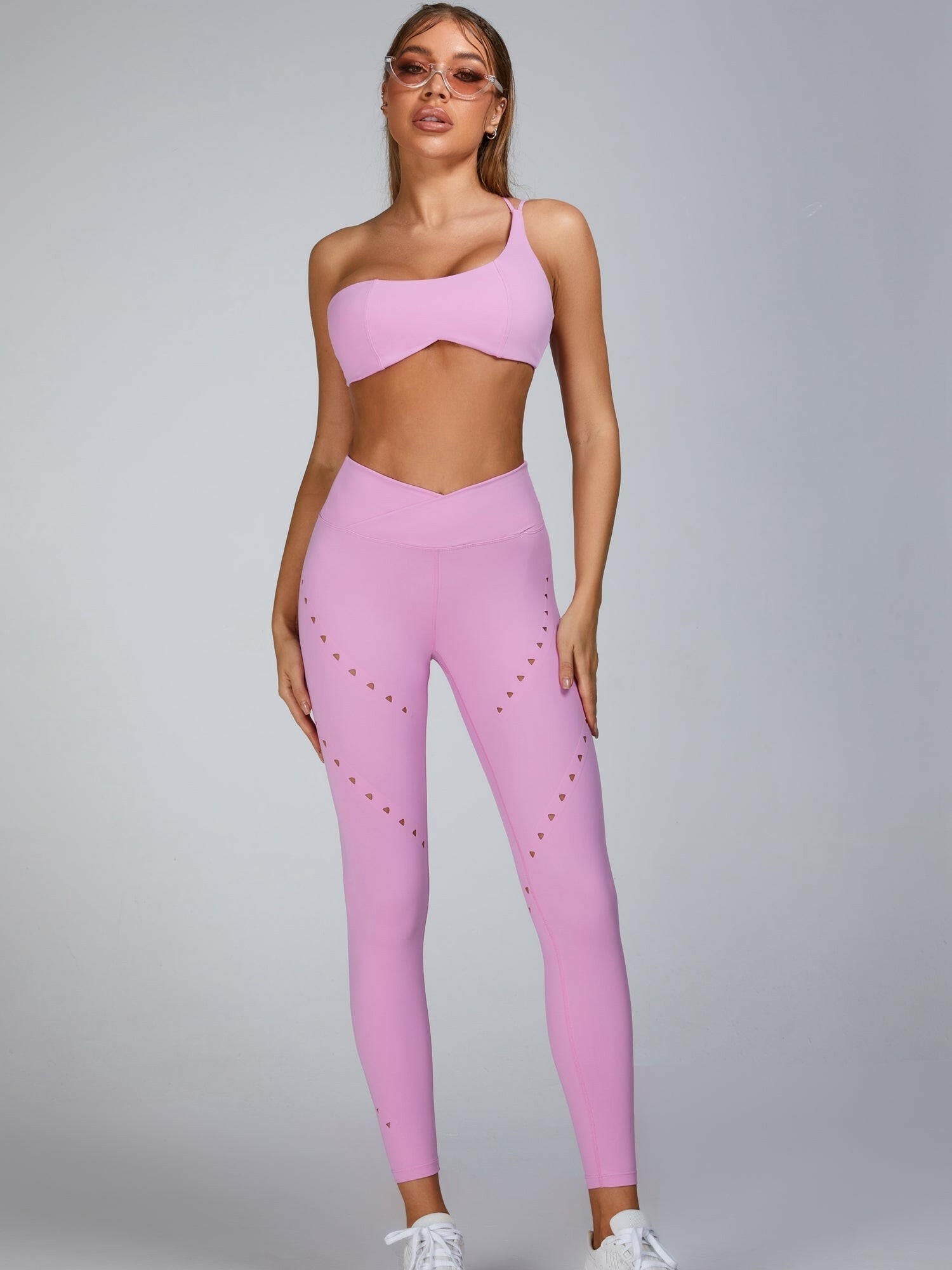 Pink Lumina Vancouver Cutout Tailoring Sports Bra with stylish design, breathable fabric, and supportive fit for active wear.