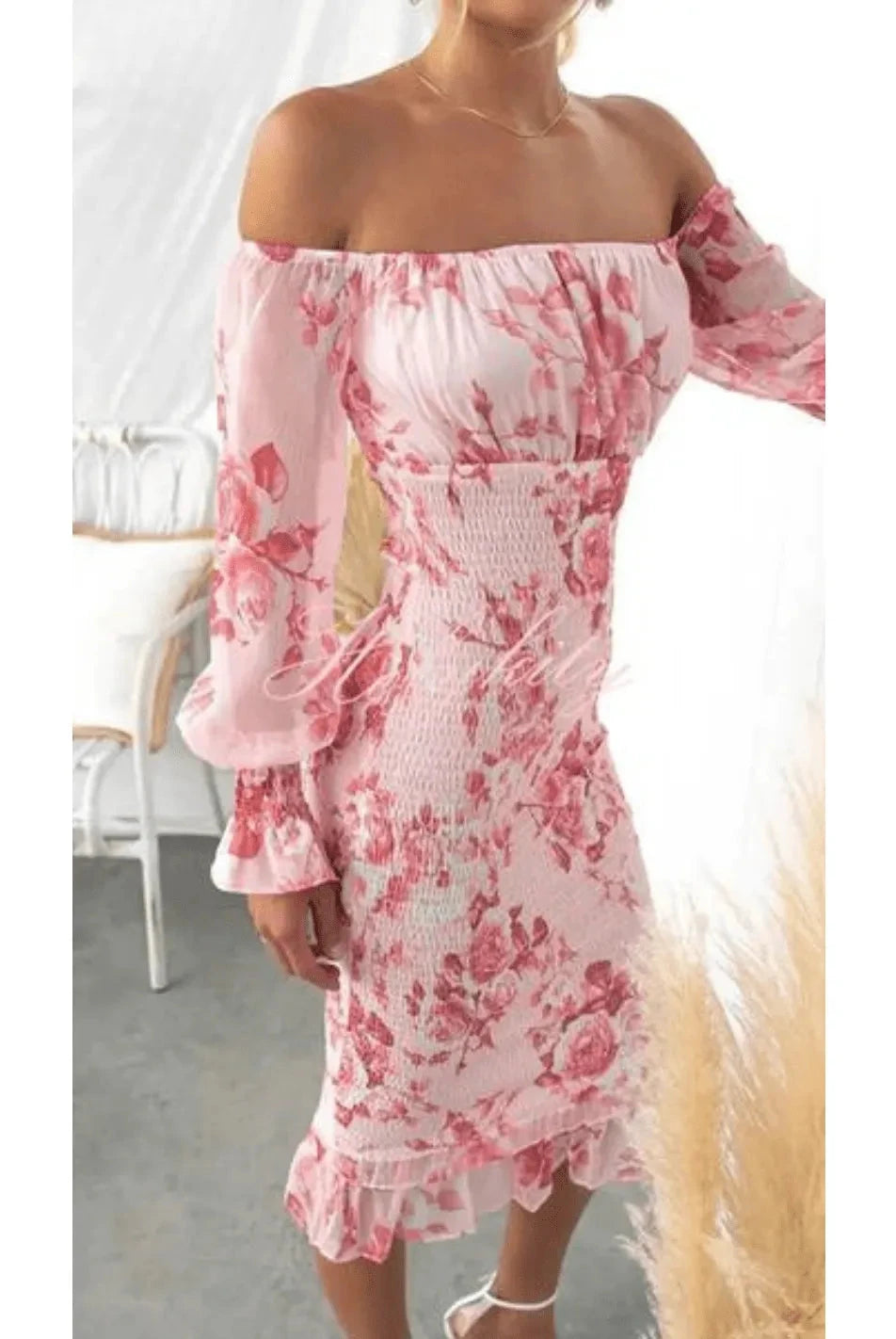 Pink Dahlia off-shoulder midi dress by Lumina Vancouver, showcasing a stylish and elegant dress with a fitted design and flowy hem.