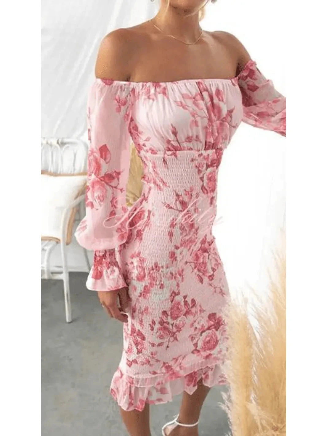 Pink Dahlia off-shoulder midi dress by Lumina Vancouver, showcasing a stylish and elegant dress with a fitted design and flowy hem.