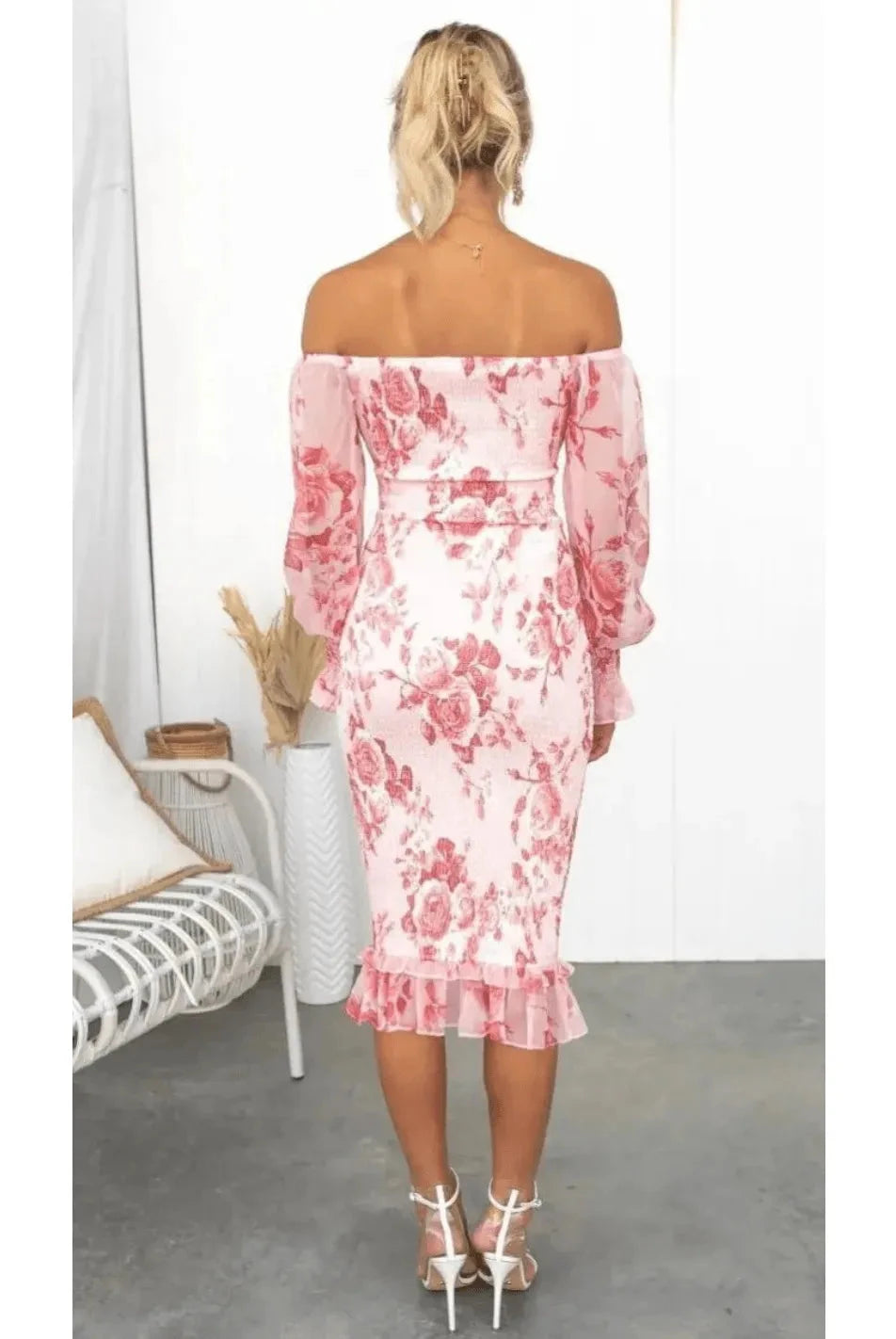 Pink Dahlia off-shoulder midi dress by Lumina Vancouver, featuring a stylish neckline and elegant flowy fabric.