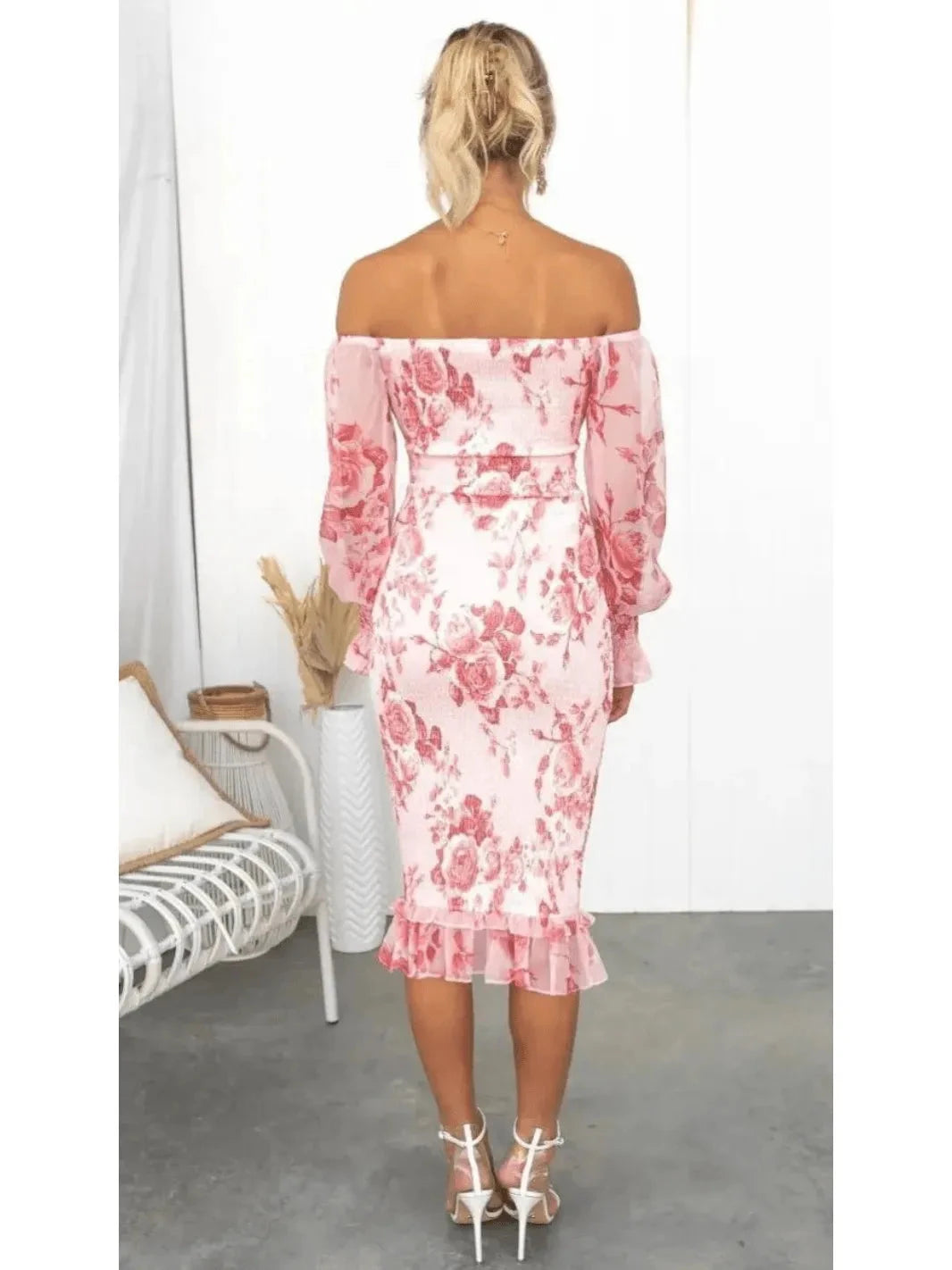 Pink Dahlia off-shoulder midi dress by Lumina Vancouver, featuring a stylish neckline and elegant flowy fabric.