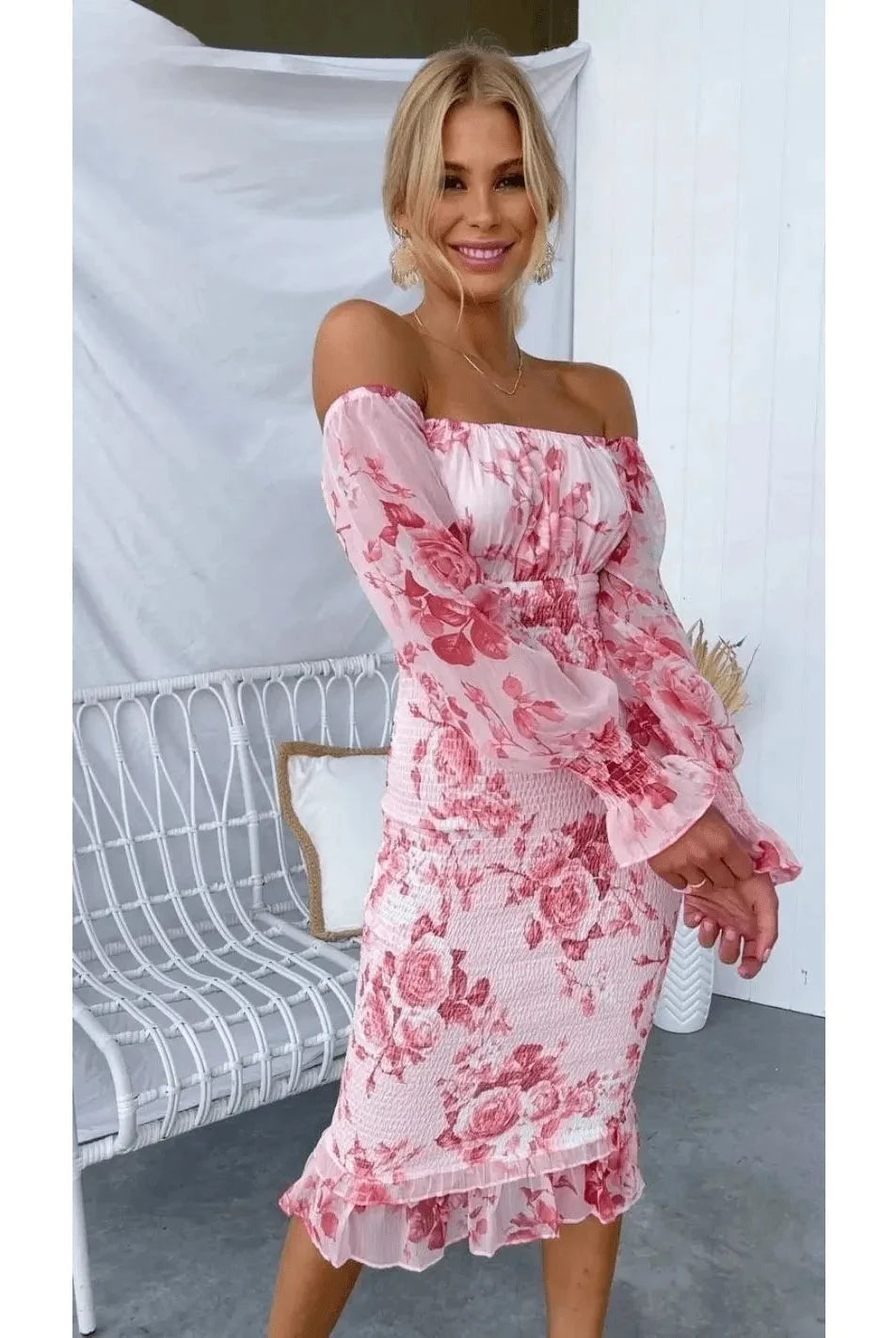 Pink Dahlia off-shoulder midi dress by Lumina Vancouver, featuring a fitted bodice and flowing skirt, perfect for elegant occasions.