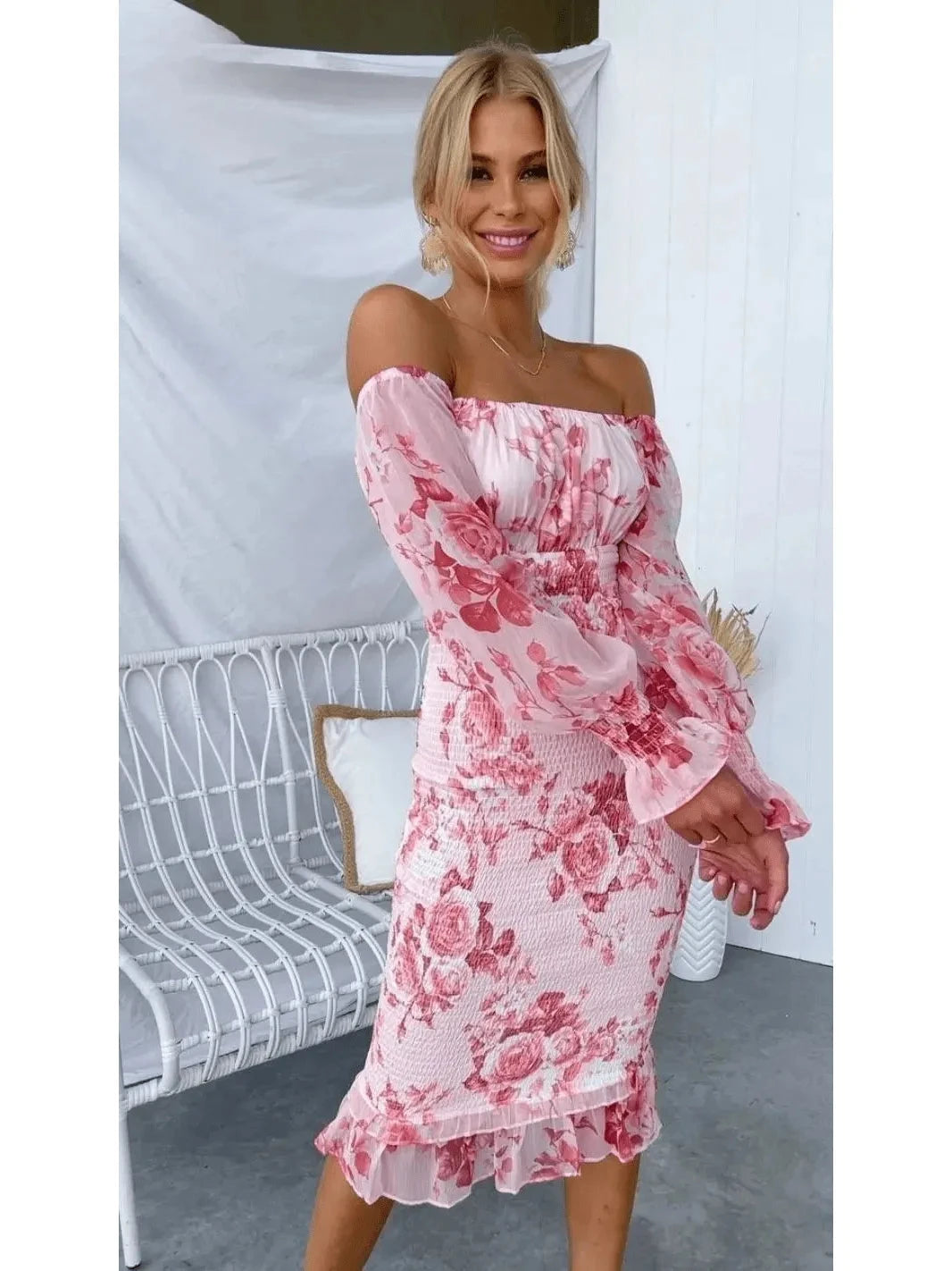 Pink Dahlia off-shoulder midi dress by Lumina Vancouver, featuring a fitted bodice and flowing skirt, perfect for elegant occasions.