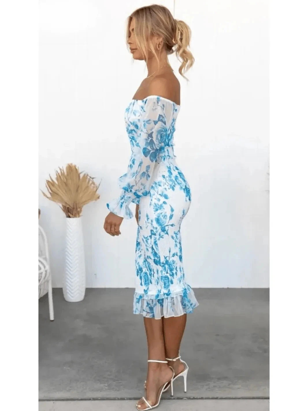 Pink Dahlia off-shoulder midi dress by Lumina Vancouver, featuring a stylish, elegant design with a fitted bodice and flowing skirt.