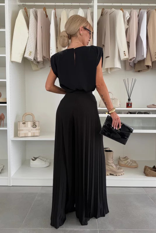 Black Daisy elegant pleated two-piece set by Lumina Wear, featuring a flattering fit and stylish clothing set design.