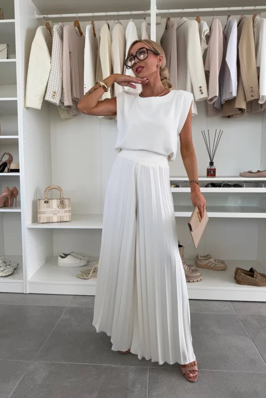 Black Daisy Lumina Wear elegant pleated two-piece set featuring a flattering fit, perfect for stylish and comfortable everyday wear.