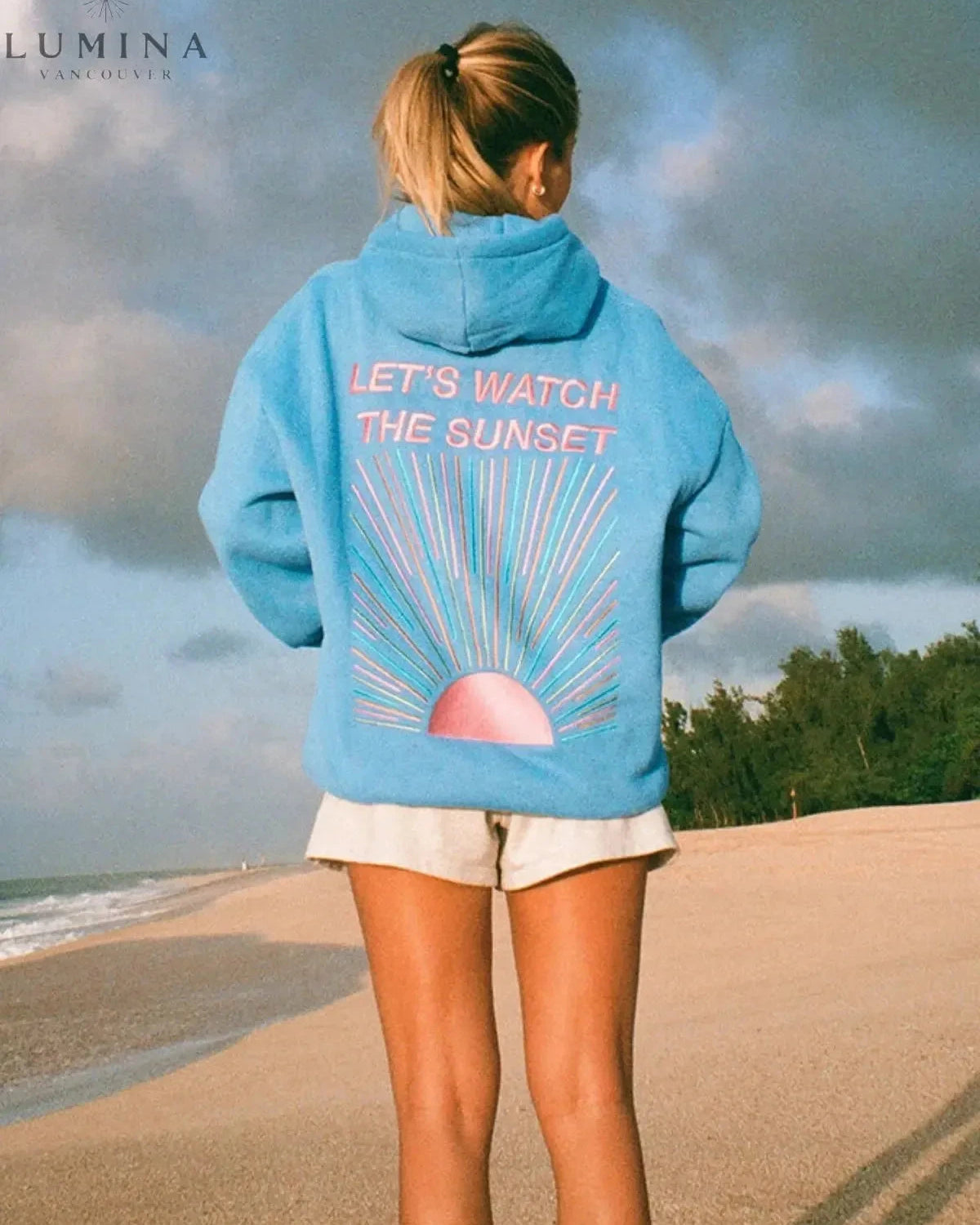 White Dalia Sunset Hoodie by Lumina Wear featuring a sunset design, soft fabric, and comfortable fit.
