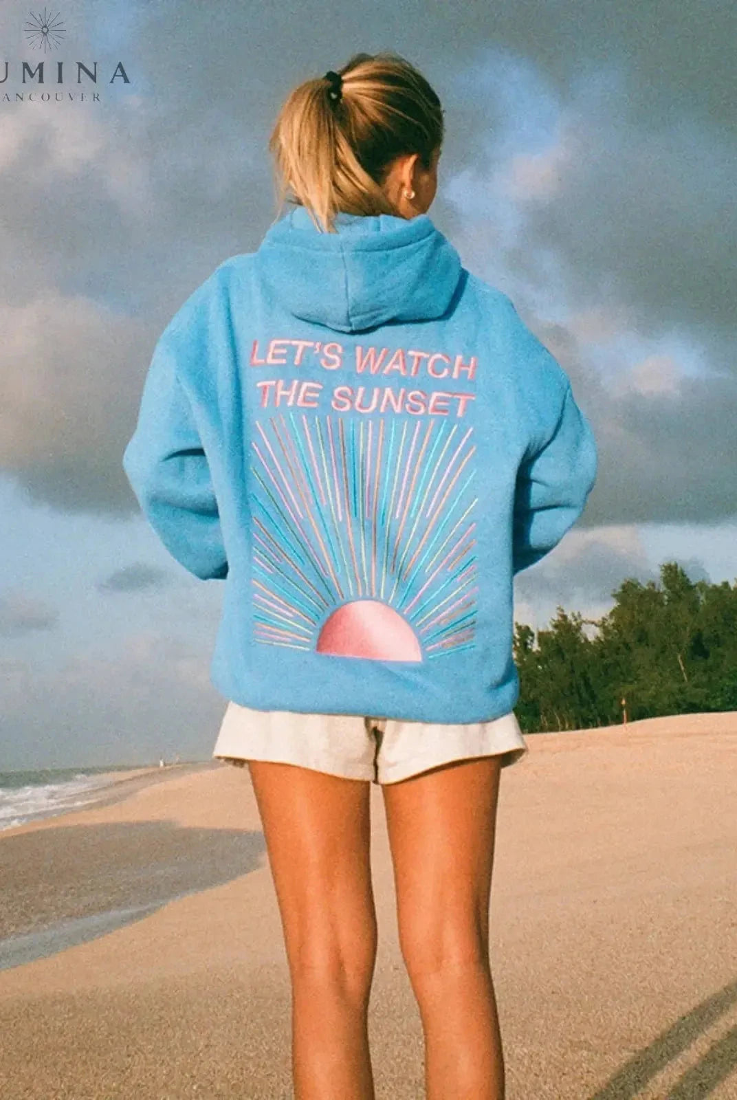 White Dalia Sunset Hoodie by Lumina Wear featuring a sunset design, soft fabric, and comfortable fit.