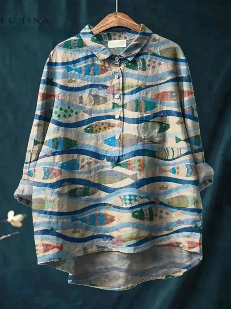 Dana Fish Print Tee by Lumina Vancouver, front view showing vibrant fish pattern on casual cotton t-shirt.