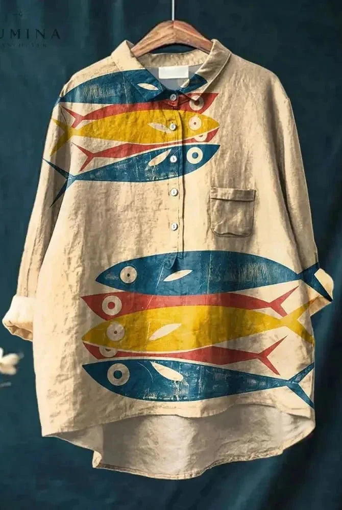 Lumina Wear Dana Fish Print T-Shirt featuring a colorful fish design on a casual crew neck tee.