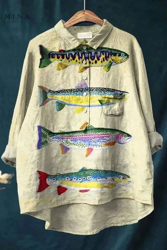 Lumina Wear Dana Fish Print T-Shirt featuring a colorful fish design on soft cotton fabric.