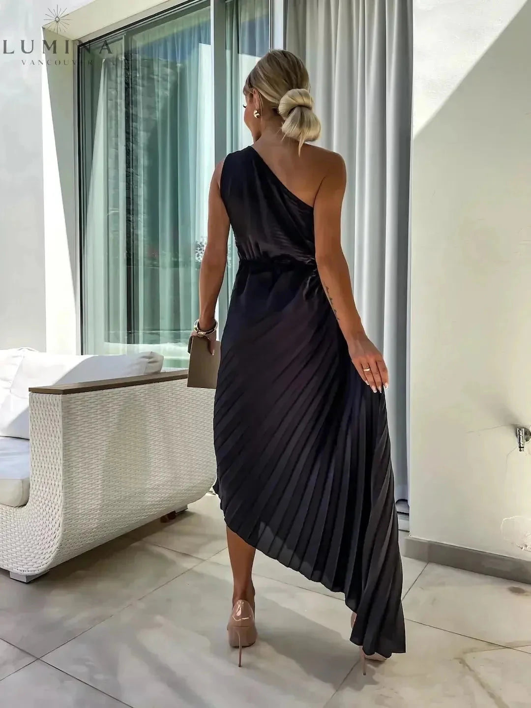 Green Dariella romantic flower one-shoulder dress by Lumina Vancouver, perfect for wedding guests, styled with elegant floral details.