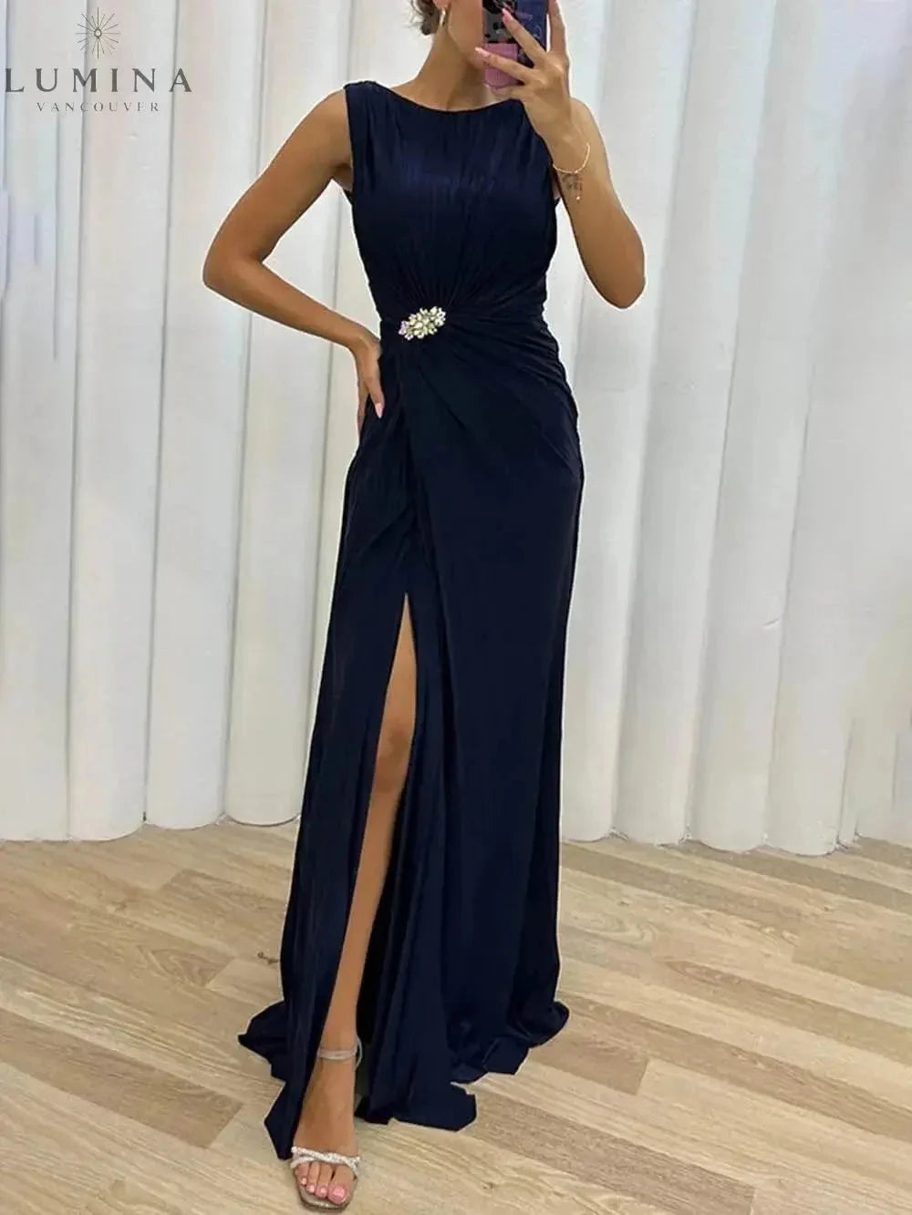 Yellow Davina pleated maxi evening dress by Lumina Vancouver, featuring elegant design, perfect for wedding guest attire.