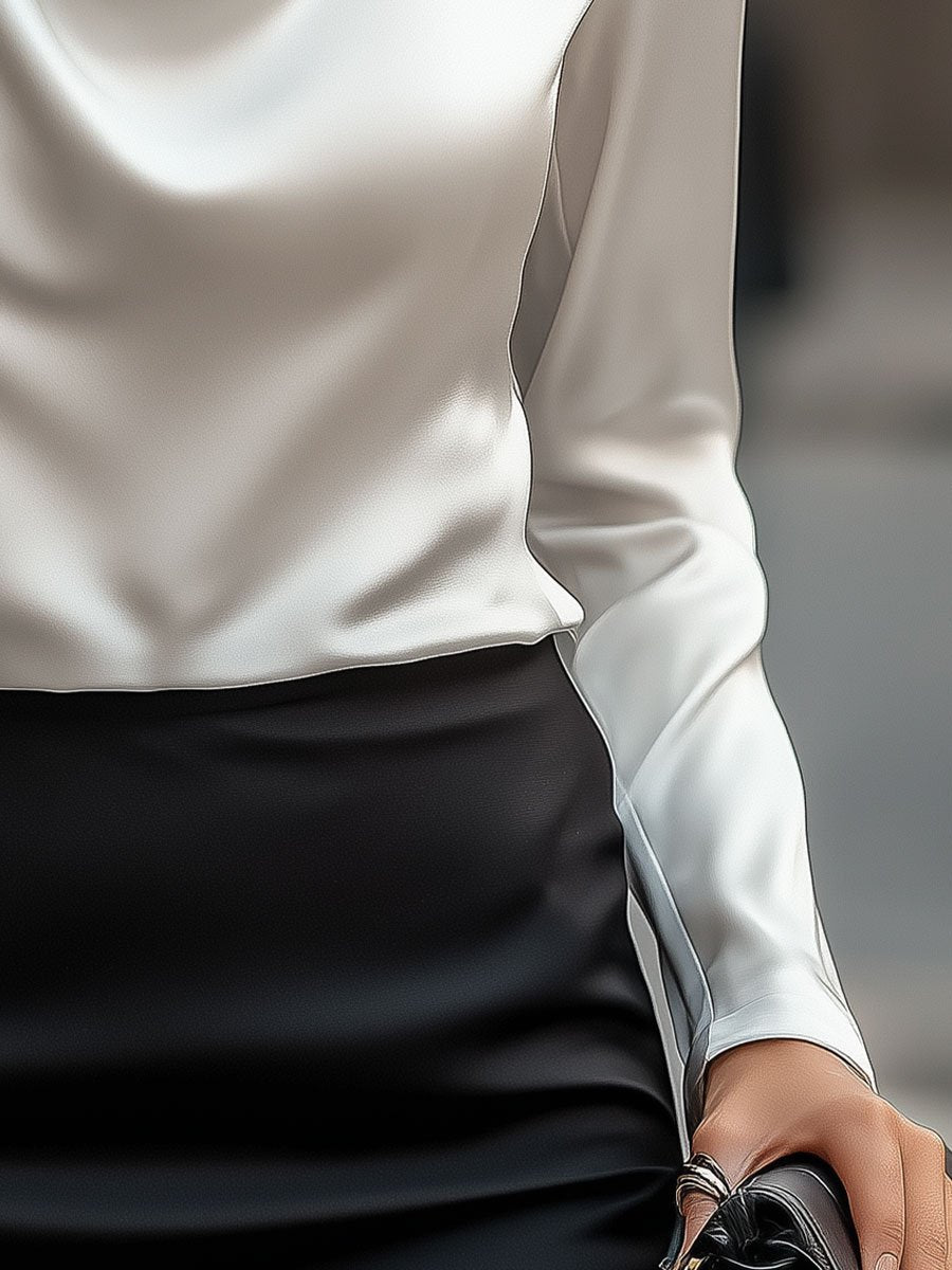 Delphine white satin draped blouse by Lumina Vancouver, shown in XS size on a model with a modern, elegant style.