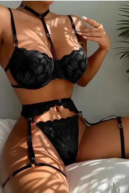 Black Devon 3-piece French lingerie set by Lumina Wear featuring delicate lace bras and matching panties on a model.