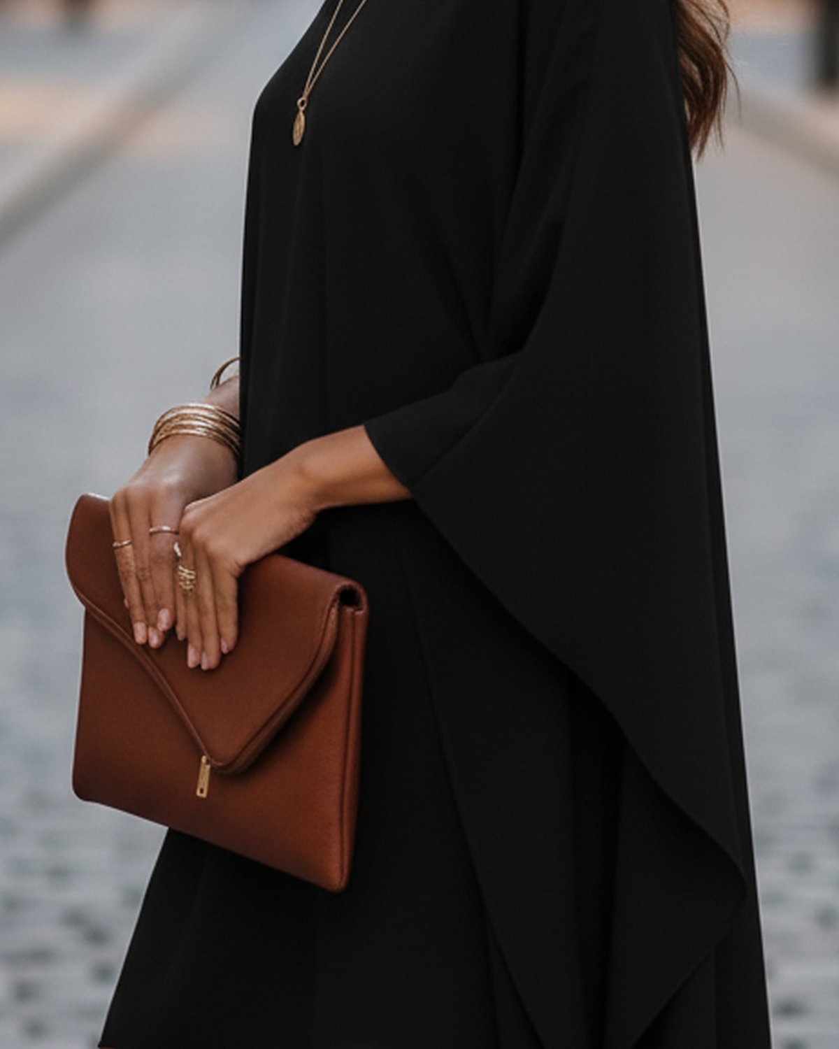 Black Eclipse Nightfall one-shoulder draped mini dress by Lumina Wear, showcasing elegant, flowing fabric and stylish design.
