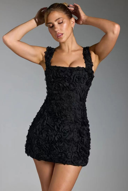 Pink Alma fitted mini dress with 3D floral details by Lumina Wear, shown on a mannequin.