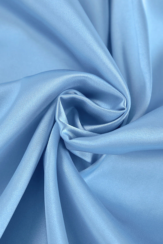 Blue satin Marit mini gown with halter neck by Lumina Wear, featuring smooth fabric and elegant design.