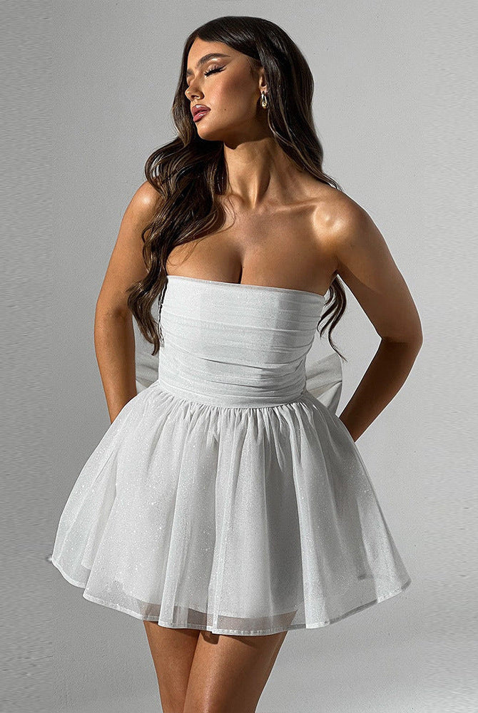 Black Lumina Wear Lova strapless slim fit mini dress displayed on a hanger with a plain background.