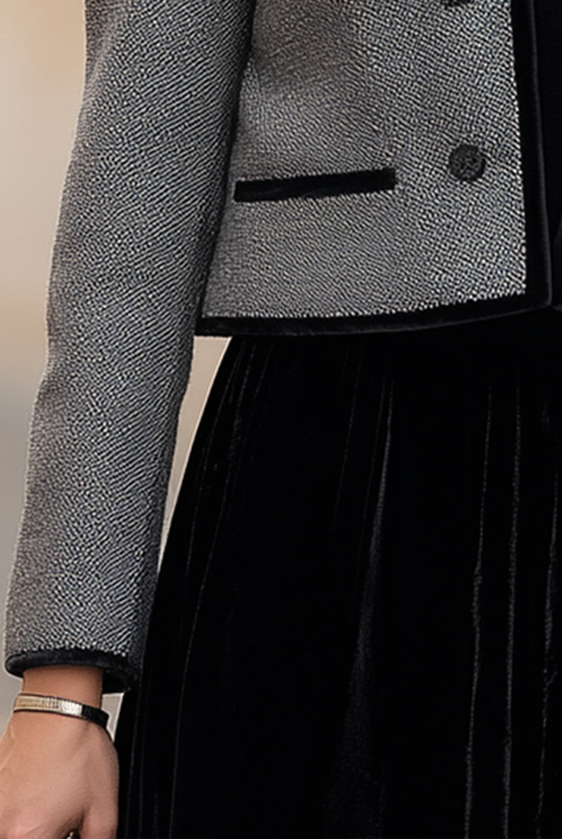 Elegant gray cropped jacket with black velvet trim by Lumina Vancouver, showcasing stylish details and tailored fit.