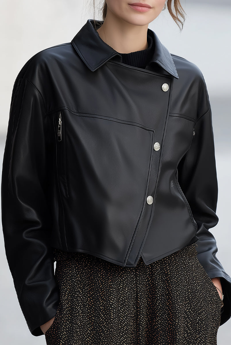 Black Cordelia asymmetrical faux leather jacket by Lumina Vancouver, shown on a model, featuring a stylish modern design.