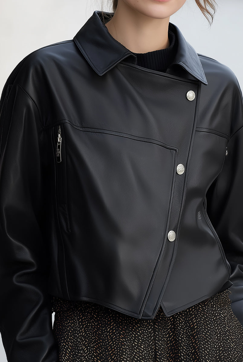 Black Cordelia asymmetrical faux leather jacket by Lumina Vancouver, shown on a mannequin with zip details and stylish design.