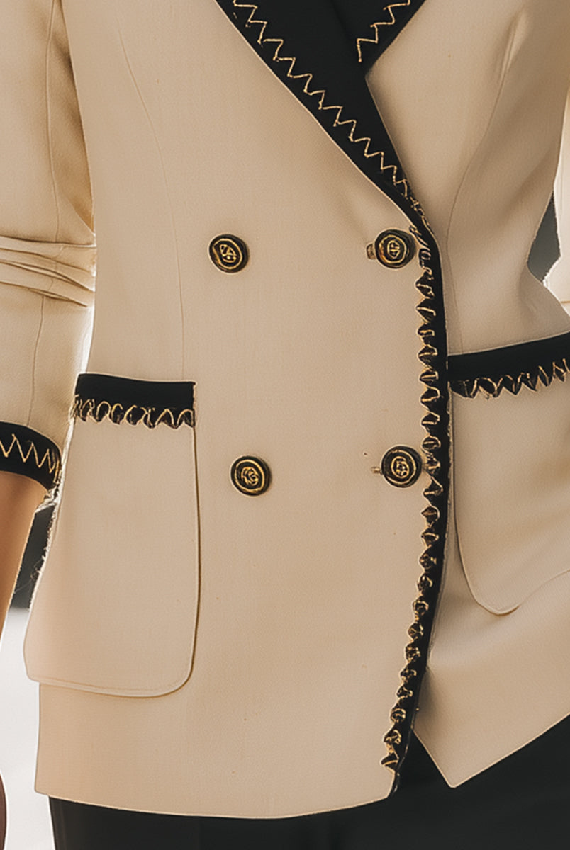 Beige blazer with black contrast trim by Lumina Wear, shown on a model, highlighting its tailored fit and stylish design.
