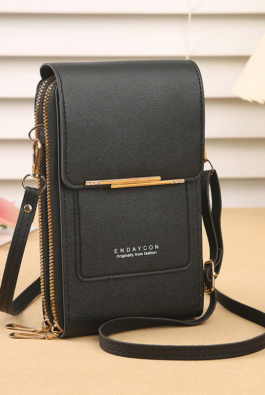 Black Lumina Elena chic touch screen messenger bag for modern women, showcasing sleek design and functional style.