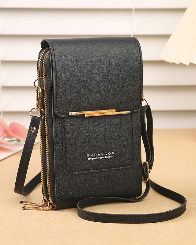 Black Lumina Wear Elena chic touch screen messenger bag for modern women, featuring sleek design and functional handbag style.