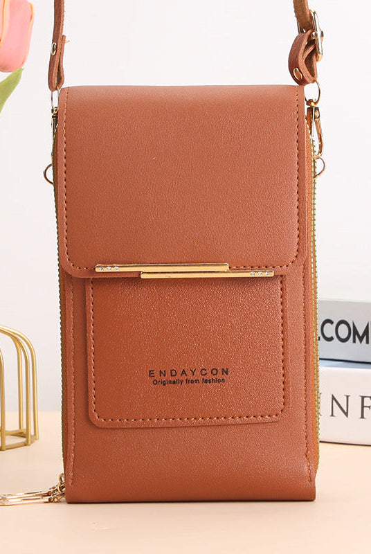 Black Elena Lumina Wear touchscreen messenger bag for women, stylish handbag with modern design and functional features.