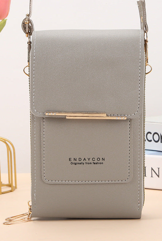 Black Lumina Wear Elena chic touch screen messenger bag for modern women, featuring sleek design and functional compartments.
