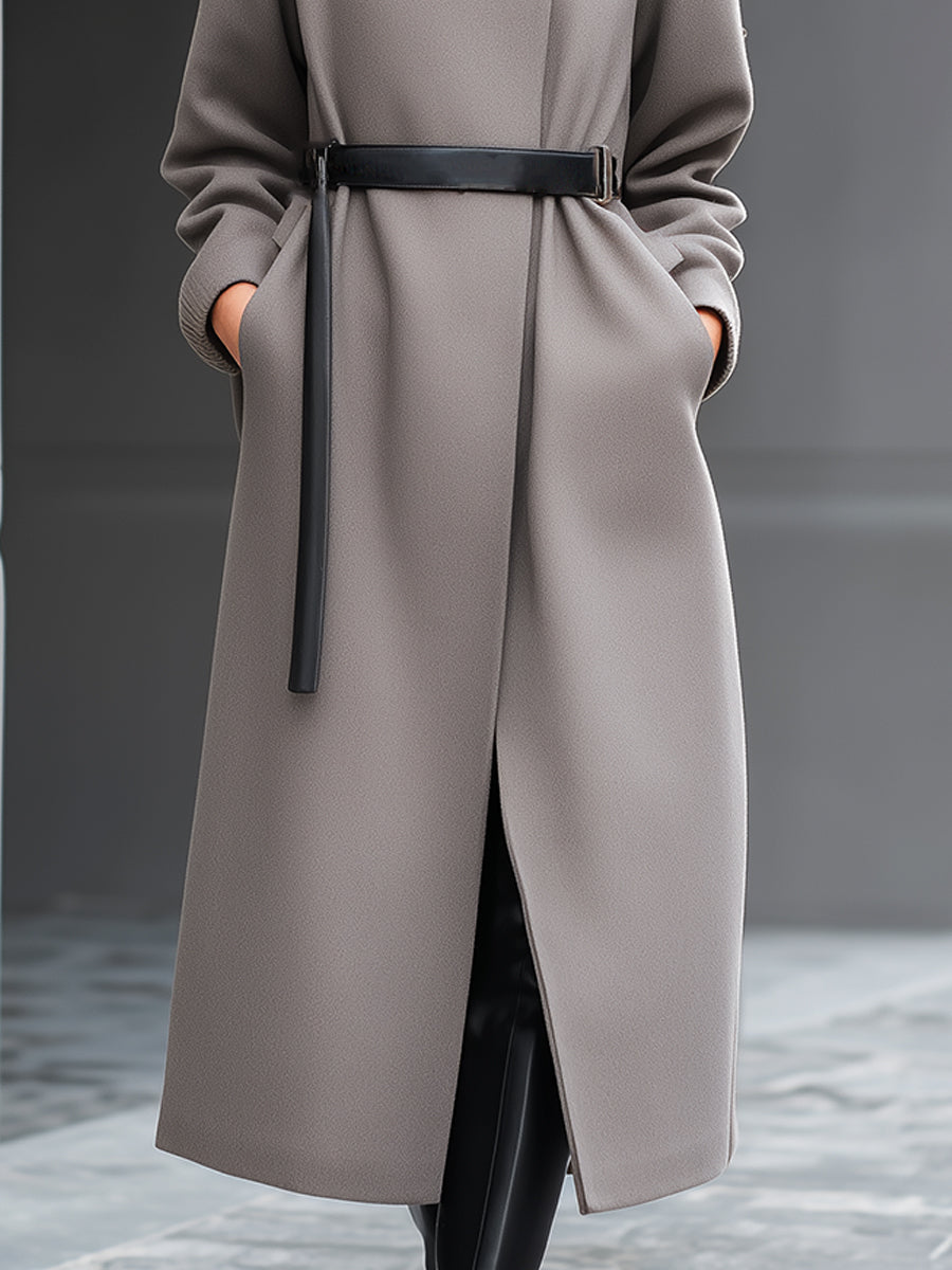 Taupe Wilhelmina coat by Lumina Vancouver featuring a minimalist belted design, shown on a model with long sleeves and a sleek silhouette.