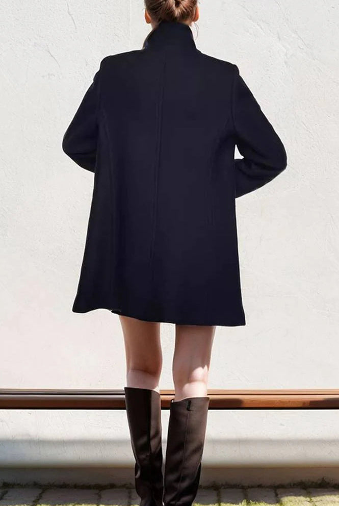 Navy blue Elena collar maxi structured coat by Lumina Vancouver, showing the elegant design and tailored fit in a close-up shot.