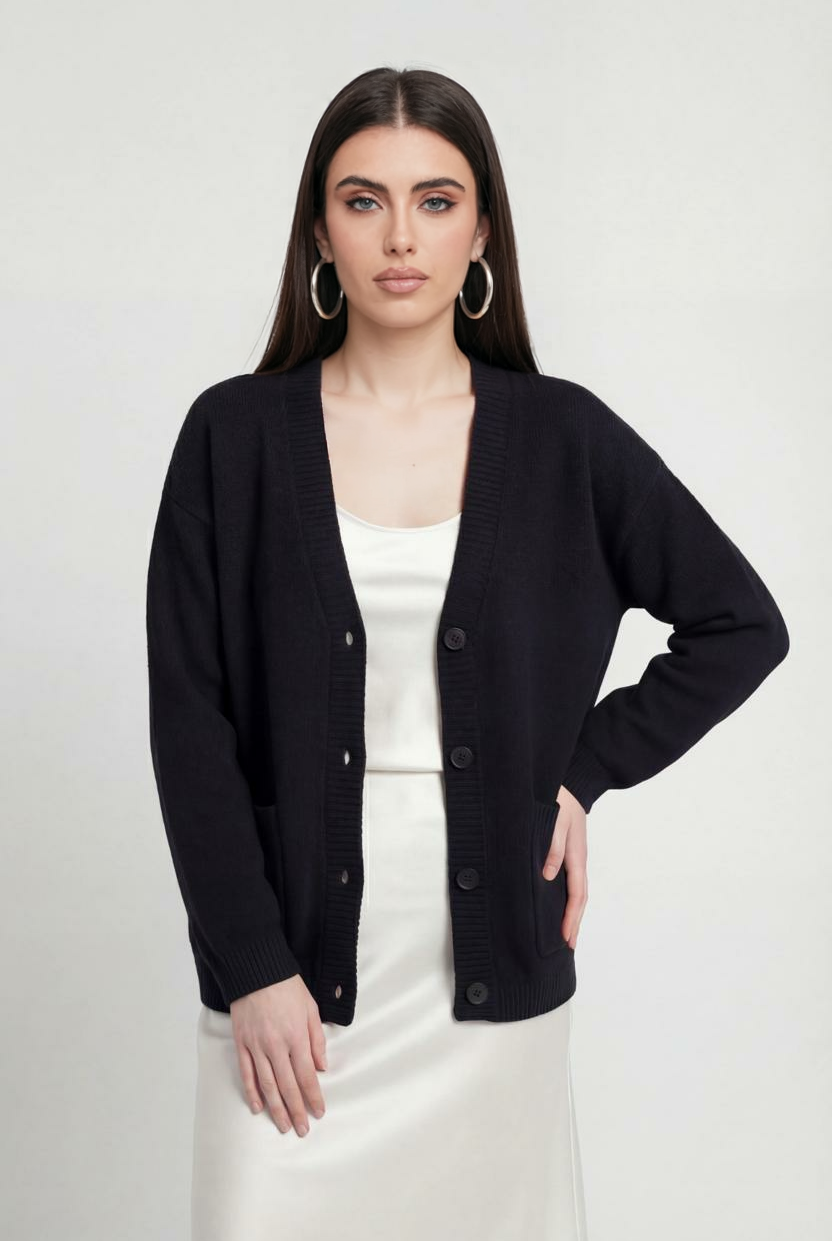 Black knit cardigan with ribbed details from Lumina Wear, featuring a cozy fit and classic design, perfect for layered looks.